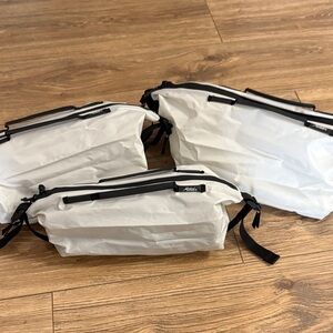 Lightweight White Travel/Toiletries Bags with Black Accents